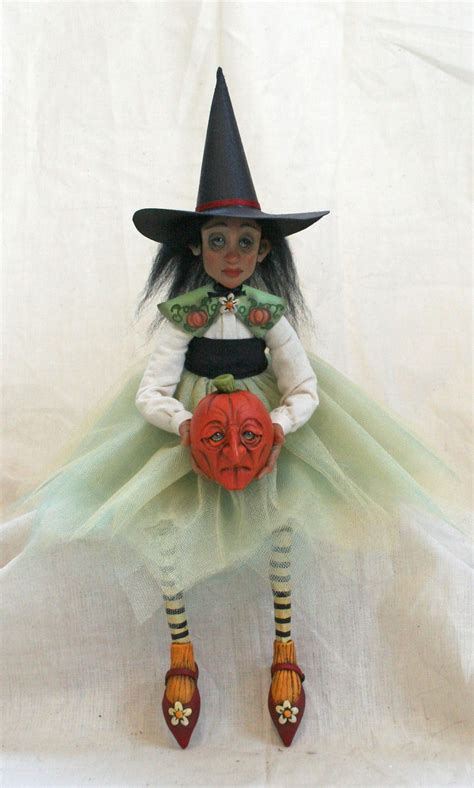 Capture the Spirit of Witchcraft with a Witch Animatronic Doll in a Seated Pose